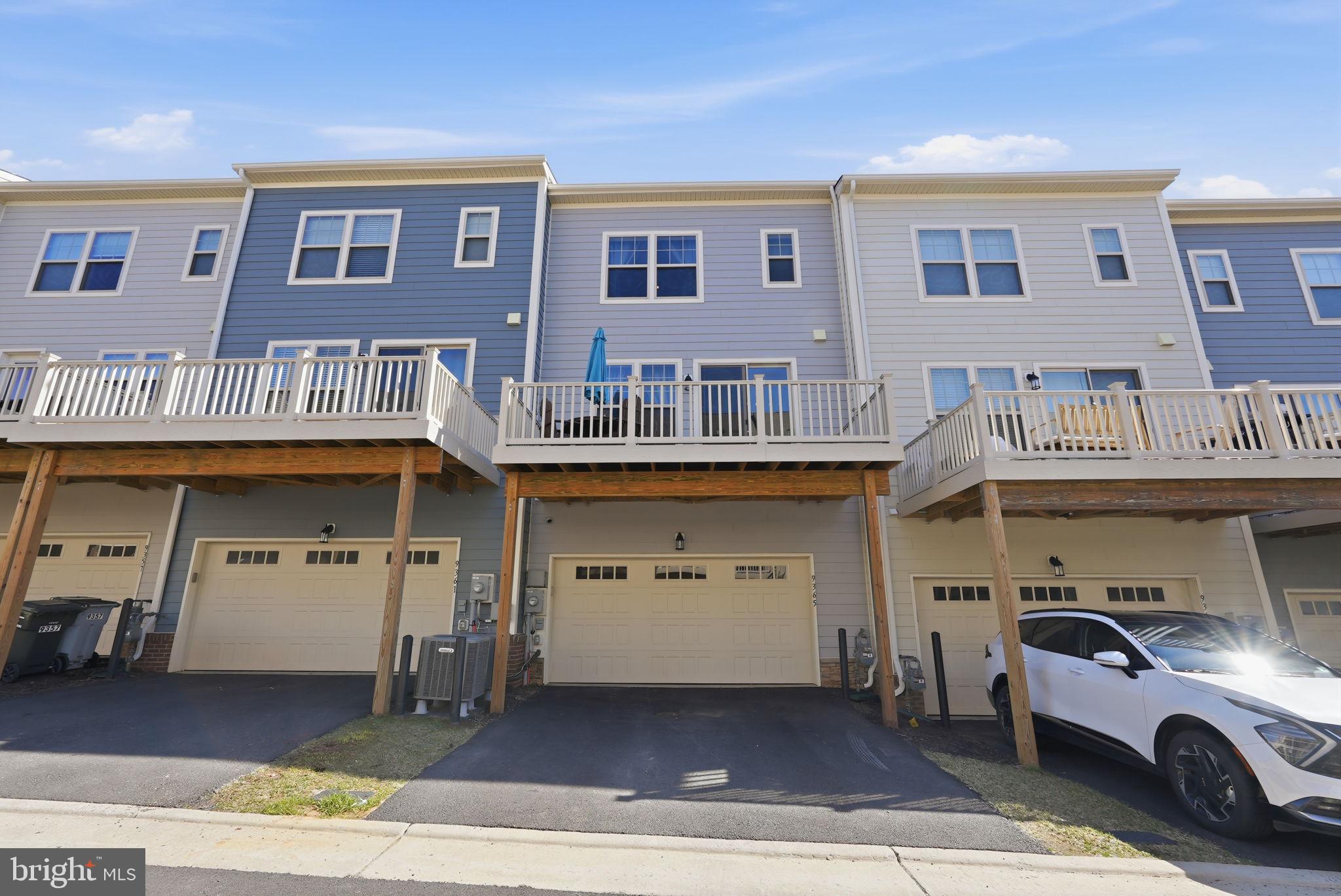 9365 Barnes Loop Manassas, VA 20110 - Photo 26 of 37 a view of a car park in front of a building