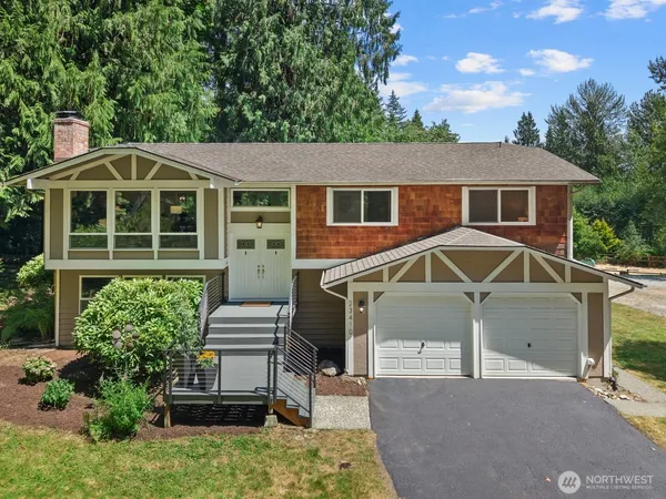 front view of a house with a yard
