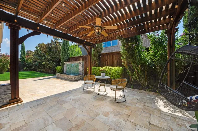 a view of yard with patio