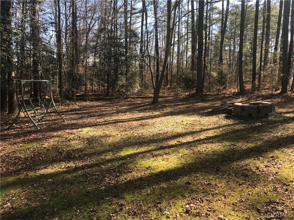 68 Rosebud Run Aylett, VA 23009 - Photo 11 of 50 Partial view of yard area to right of house, fire