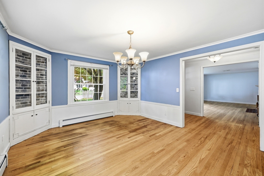 130 Connecticut Avenue Springfield, MA 01107 - Photo 22 of 40 a view of an empty room with wooden floor and a window
