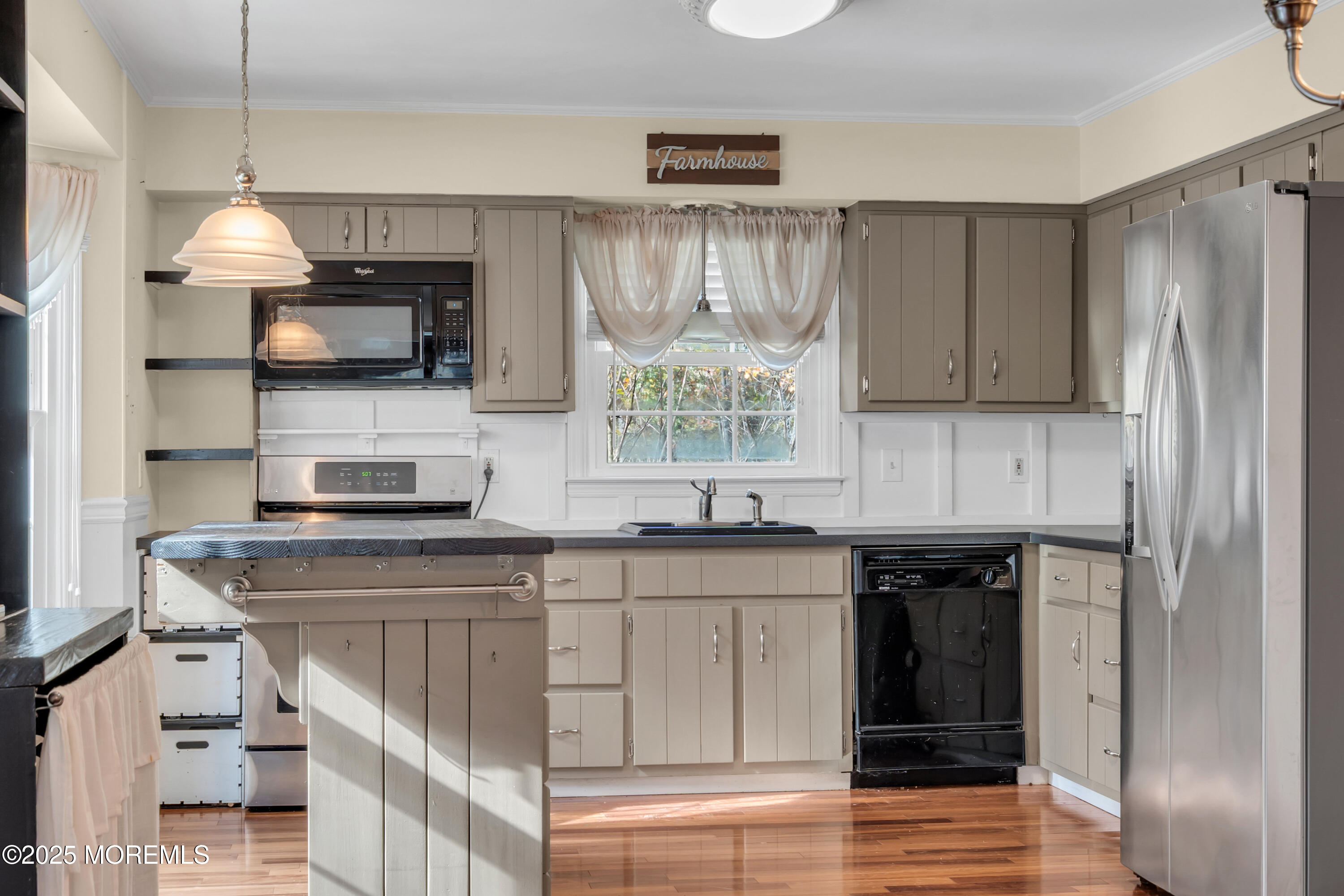 638 Freehold Road Jackson, NJ 08527 - Photo 12 of 61 a kitchen with stainless steel appliances a sink stove and refrigerator