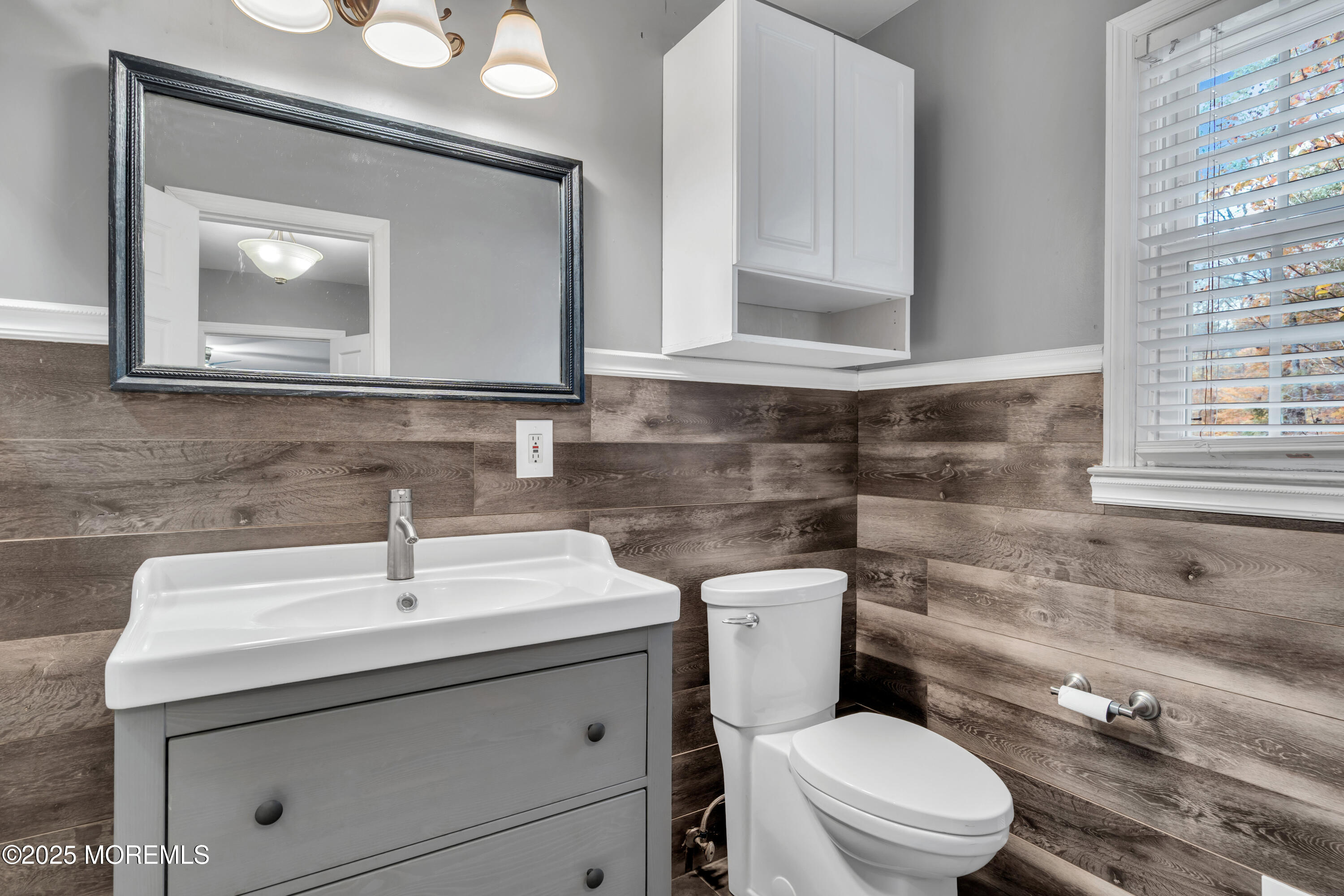 638 Freehold Road Jackson, NJ 08527 - Photo 23 of 61 a bathroom with a toilet sink and mirror