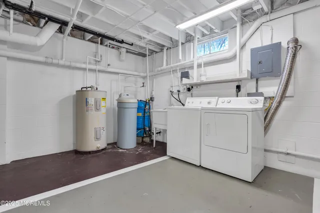 a living room with a table and a potted plant
