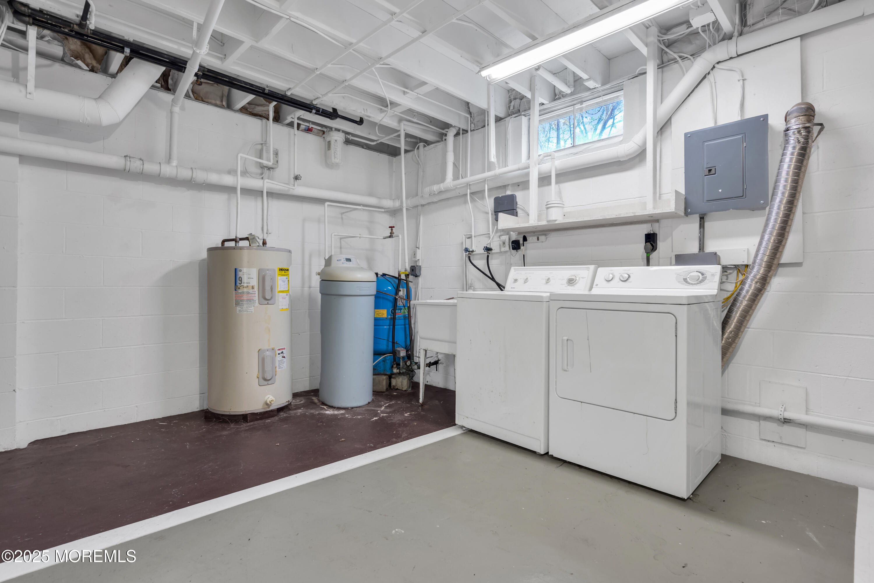 638 Freehold Road Jackson, NJ 08527 - Photo 26 of 61 a utility room with dryer and washer