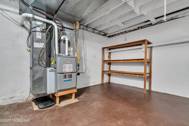 a view of an empty room with a kitchen