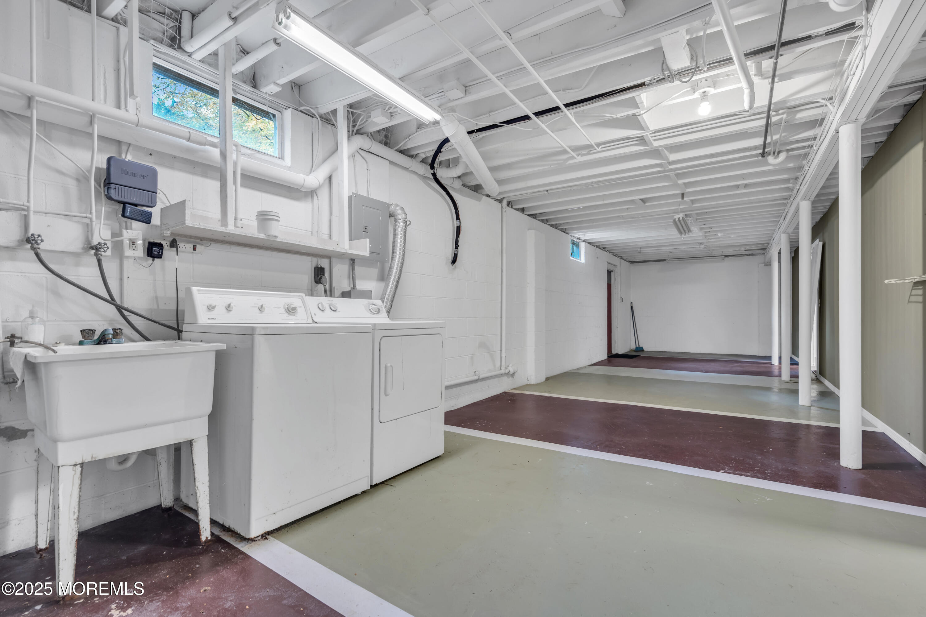 638 Freehold Road Jackson, NJ 08527 - Photo 28 of 61 a utility room with dryer and washer