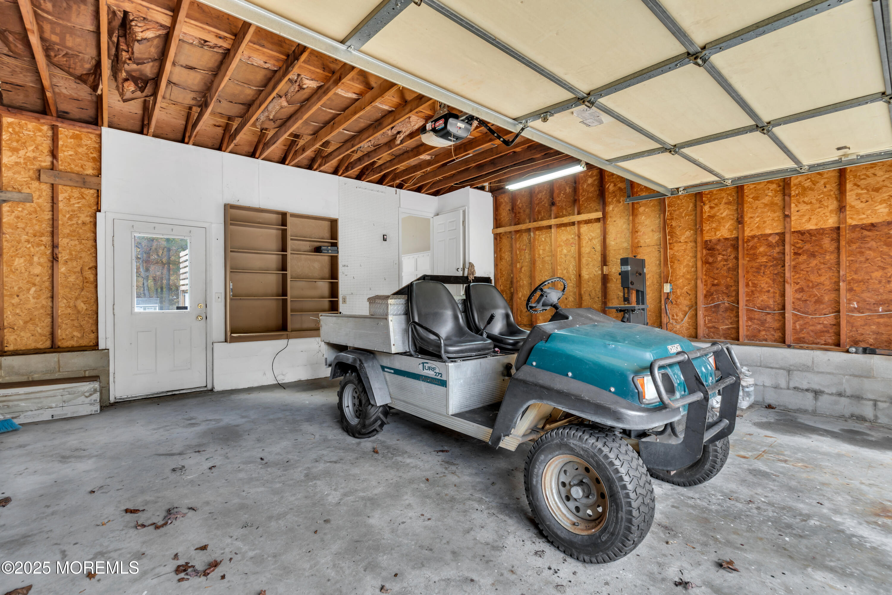 638 Freehold Road Jackson, NJ 08527 - Photo 33 of 61 a car parked in front of a house