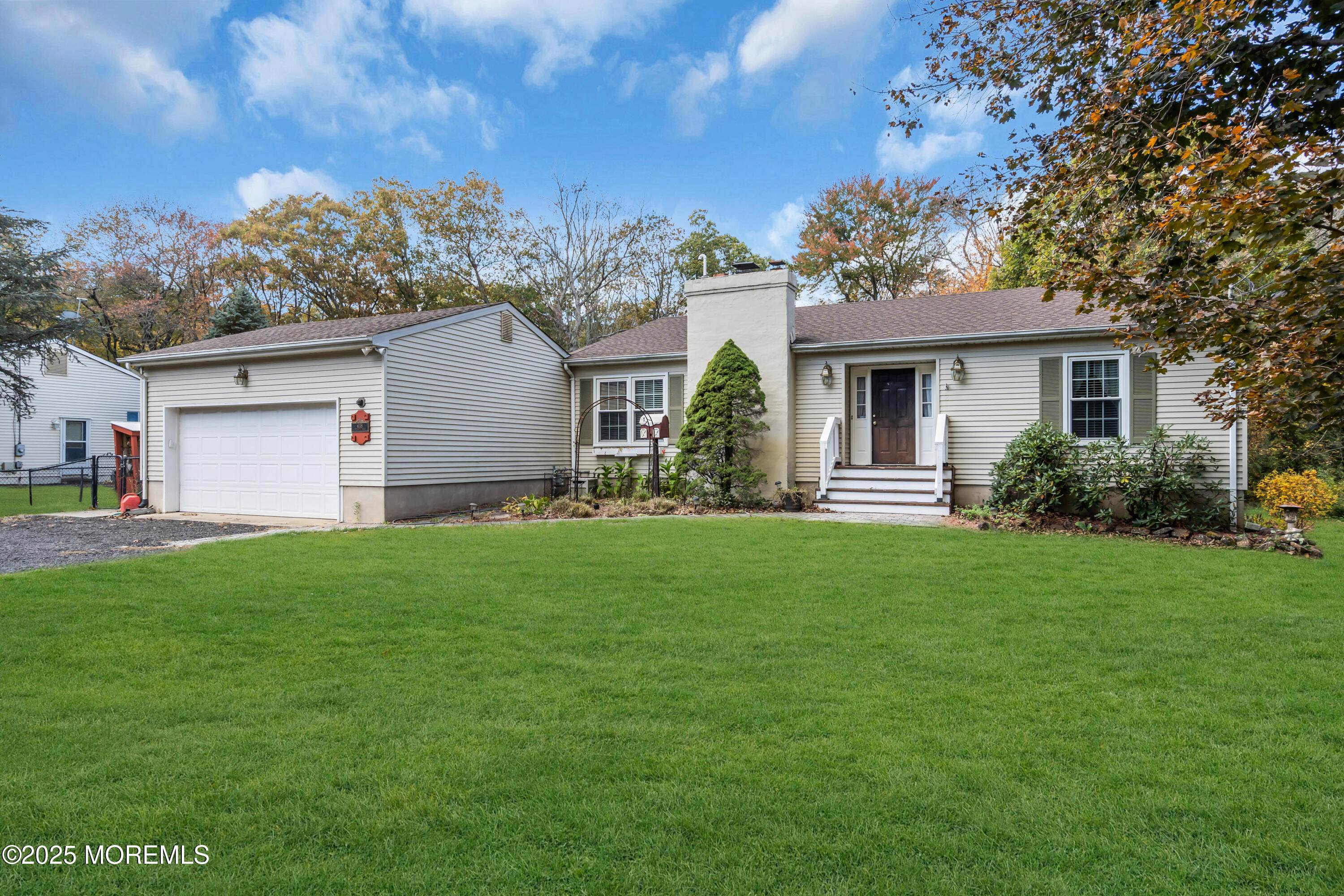 638 Freehold Road Jackson, NJ 08527 - Photo 40 of 61 a front view of house with yard and green space