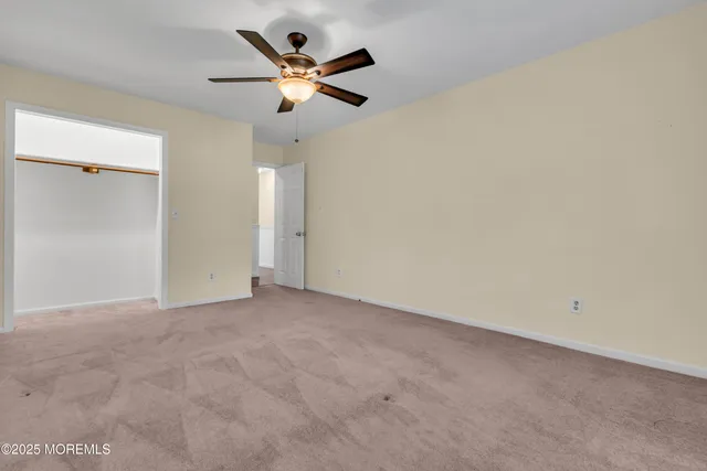 a view of a building with a yard