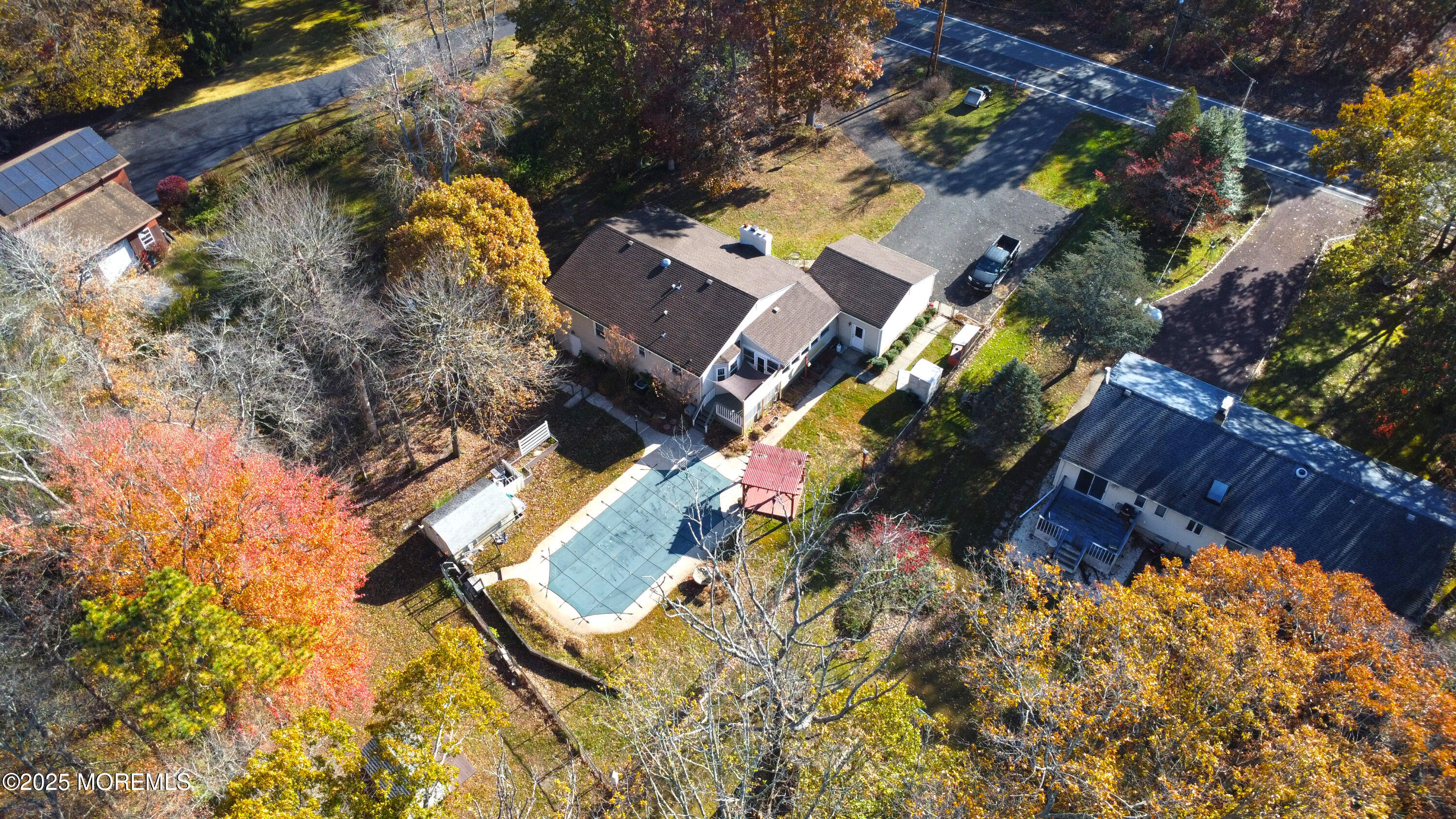 638 Freehold Road Jackson, NJ 08527 - Photo 60 of 61 an aerial view of a house with a yard and wooden fence