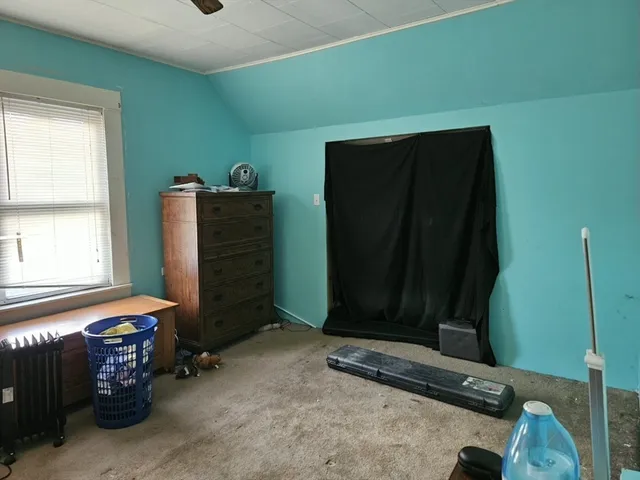 a room with a window and storage