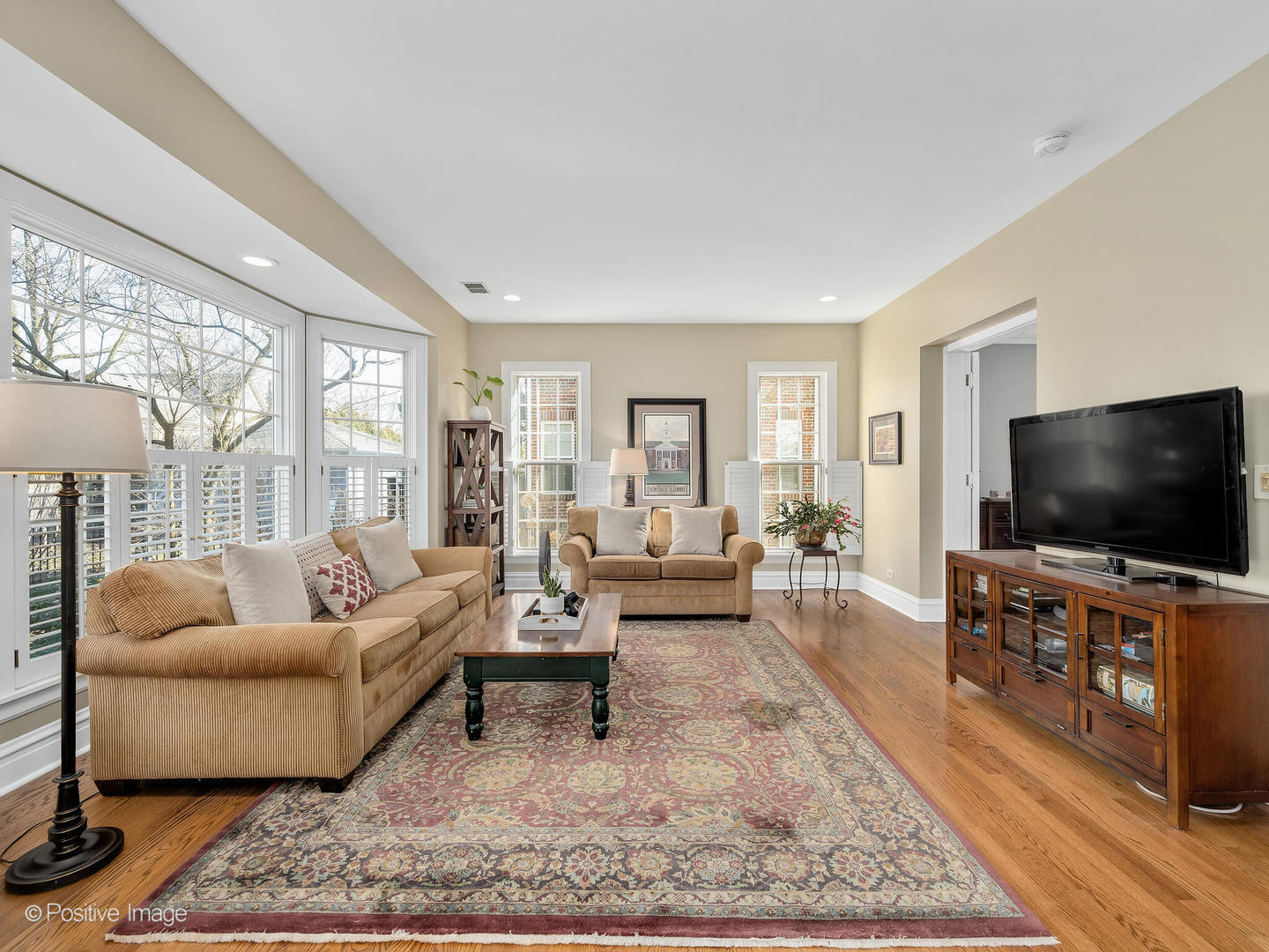 207 Ravine Road Hinsdale, IL 60521 - Photo 11 of 35 a living room with furniture and a flat screen tv