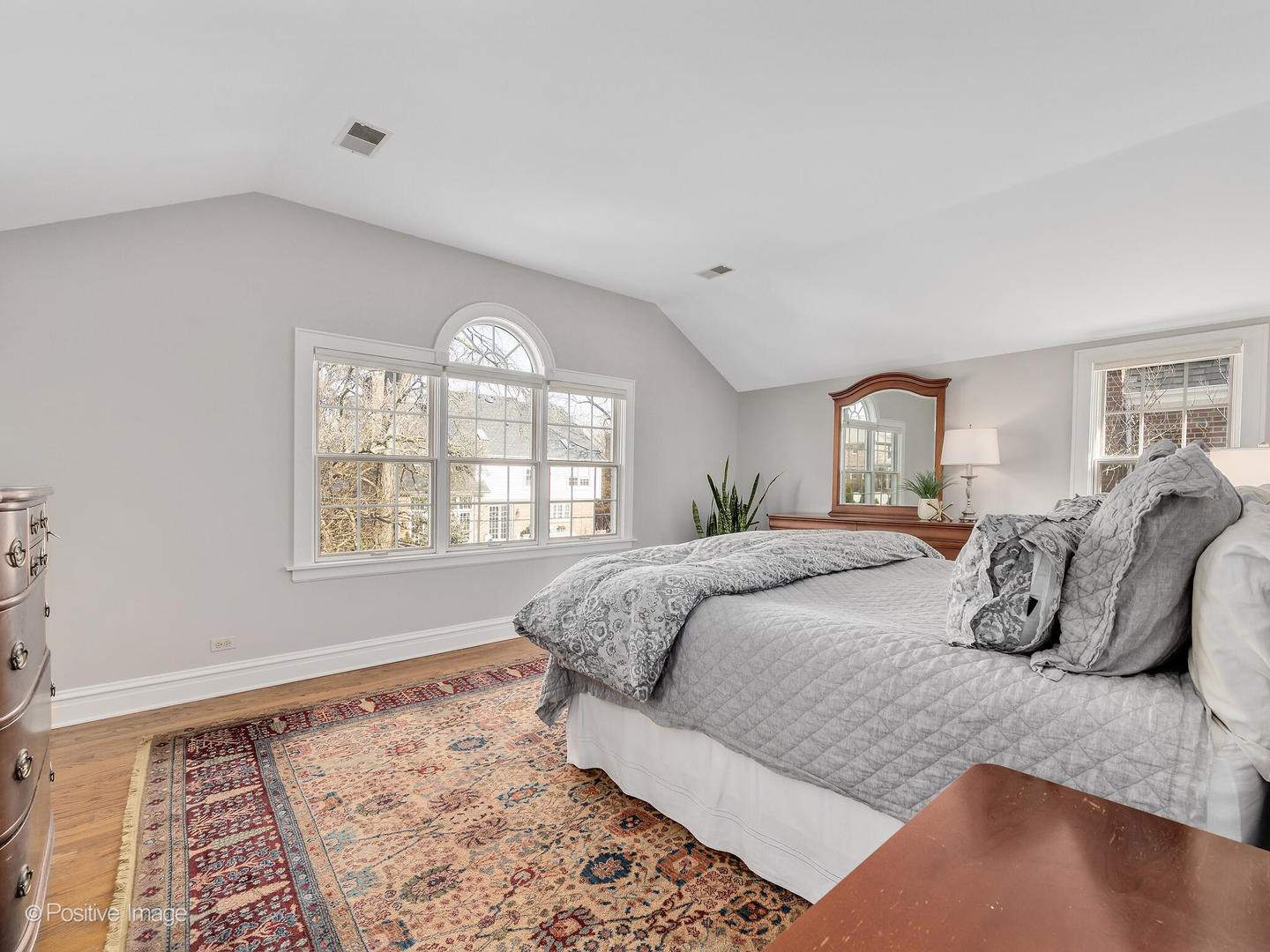 207 Ravine Road Hinsdale, IL 60521 - Photo 18 of 35 a bedroom with a large bed and a window
