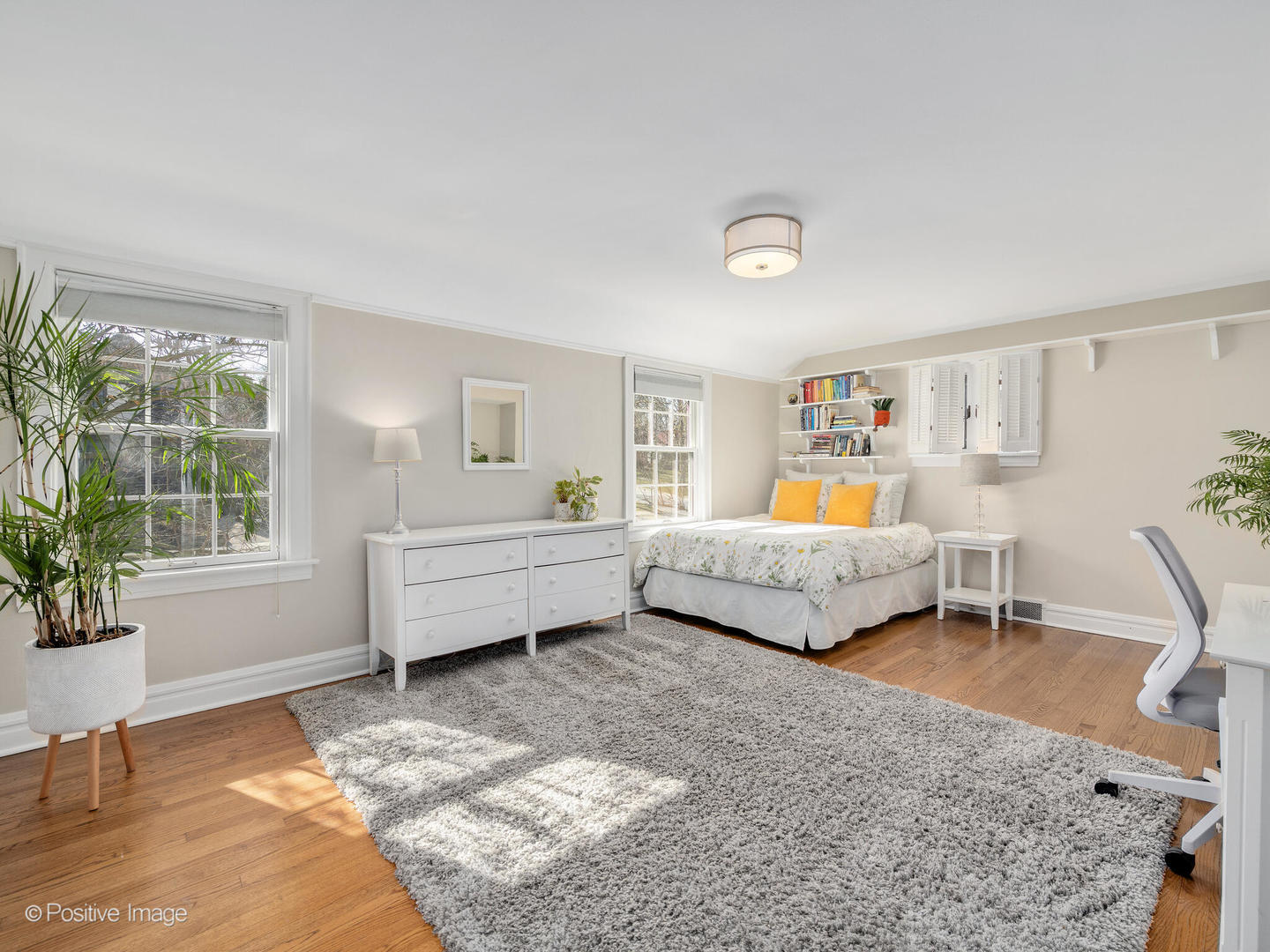 207 Ravine Road Hinsdale, IL 60521 - Photo 21 of 35 a bedroom with a bed and a large window