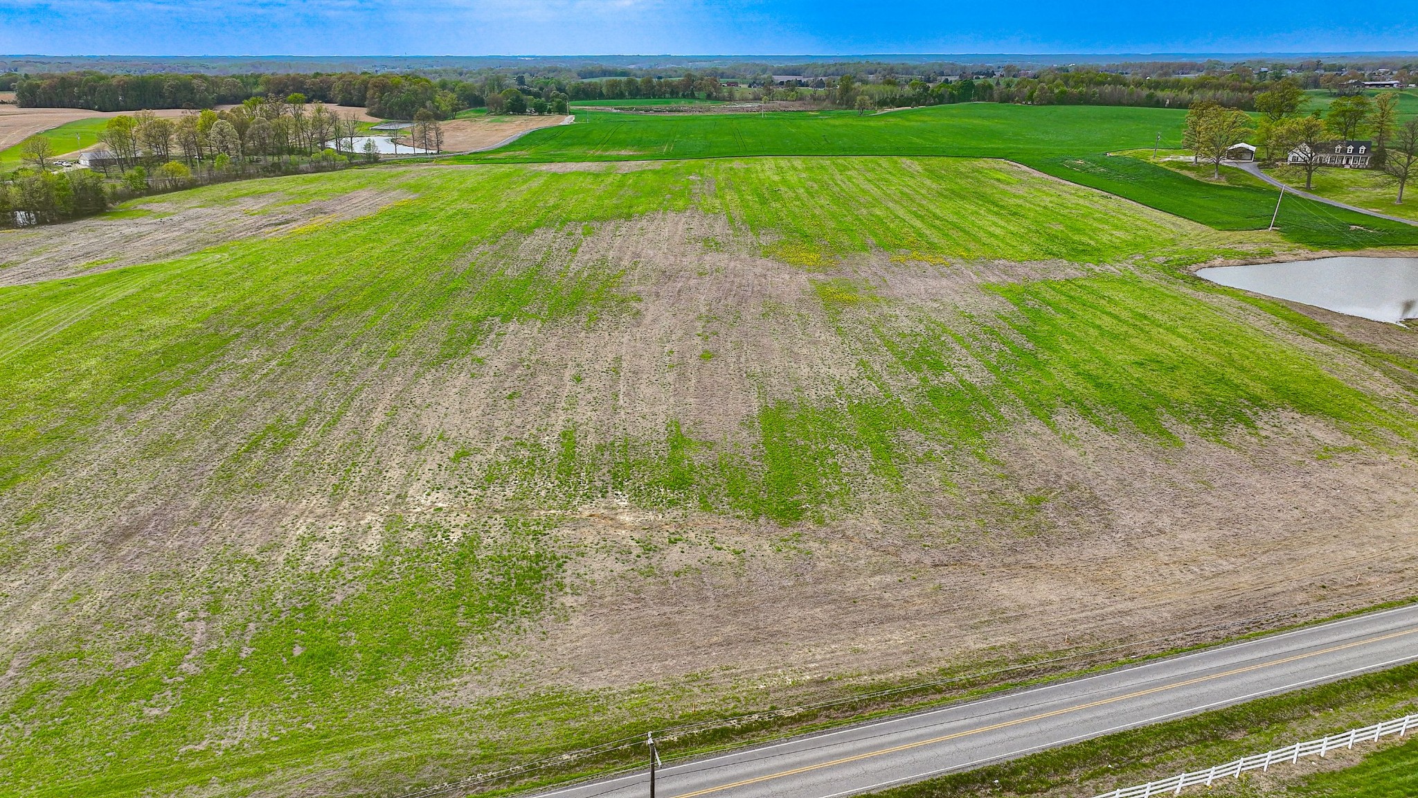 1347 North Corinth Road Portland, TN 37148 - Photo 7 of 10 a view of a field with a big yard