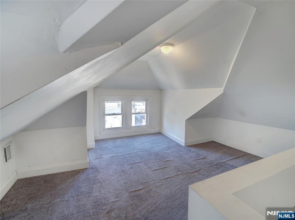 222 Lafayette Avenue, Unit 2 Lyndhurst, NJ 07071 - Photo 12 of 15 an empty room with windows