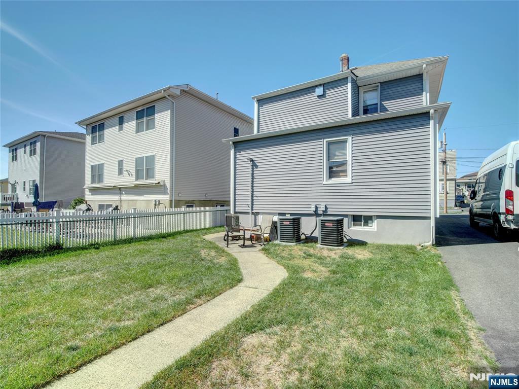 222 Lafayette Avenue, Unit 2 Lyndhurst, NJ 07071 - Photo 13 of 15 a view of a house with a yard