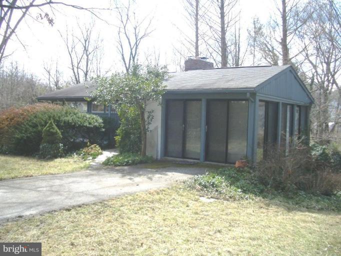 7904 Springway Road Towson, MD 21204 - Photo 11 of 13 a view of a house with a yard