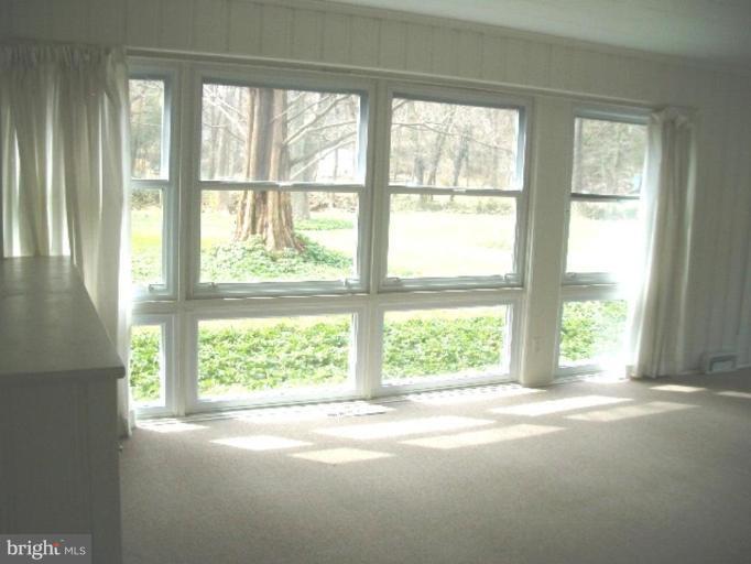7904 Springway Road Towson, MD 21204 - Photo 10 of 13 a view of empty room with window