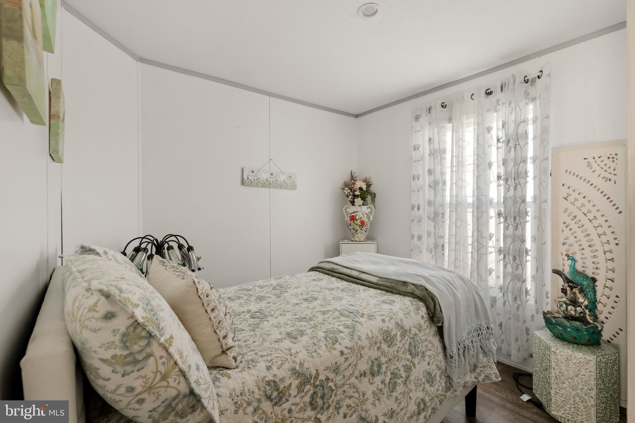 26 Ruth Drive Gordonville, PA 17529 - Photo 15 of 29 a bedroom with a bed and a chair