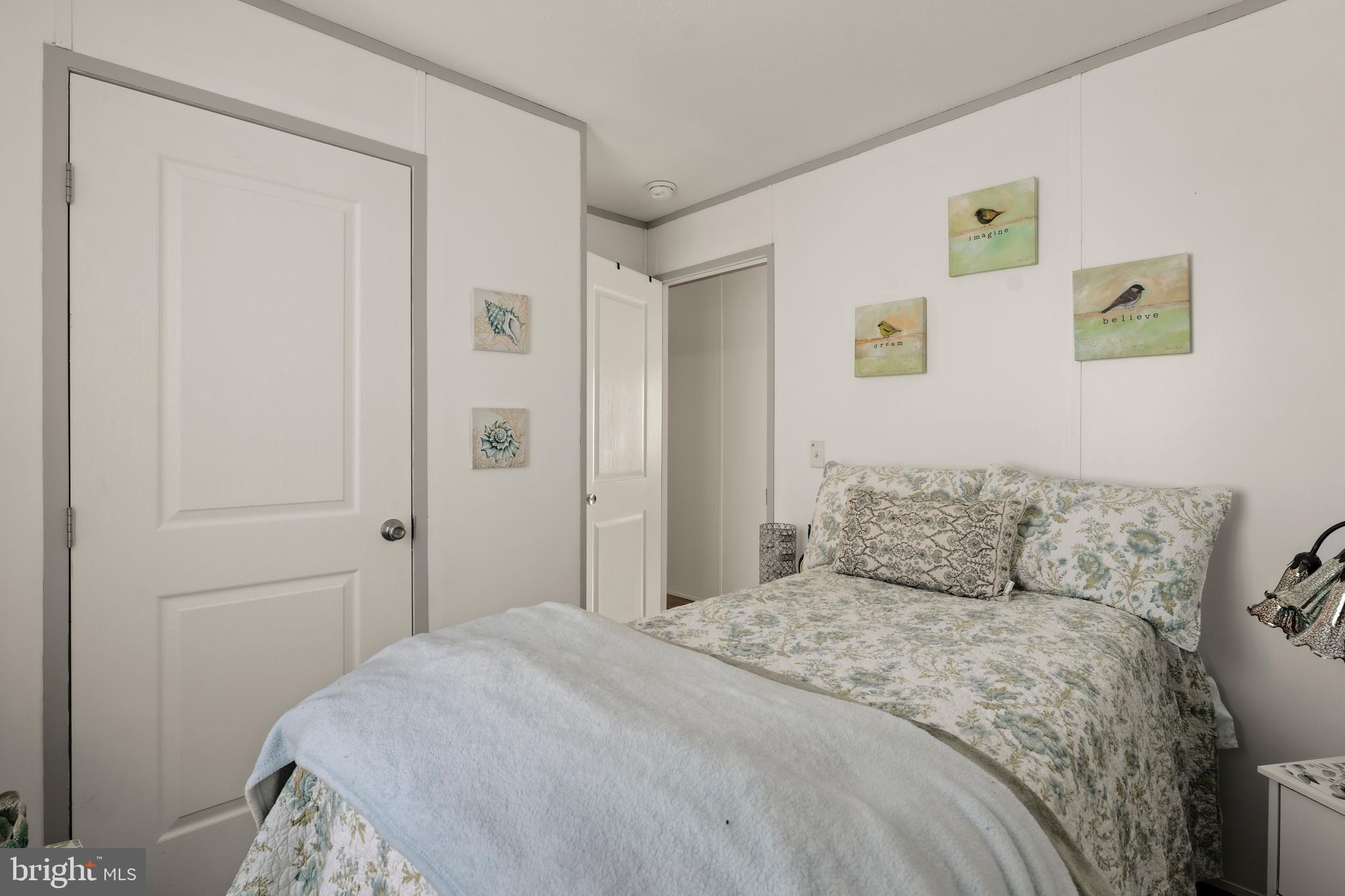 26 Ruth Drive Gordonville, PA 17529 - Photo 16 of 29 a bedroom with a bed and painting on the wall