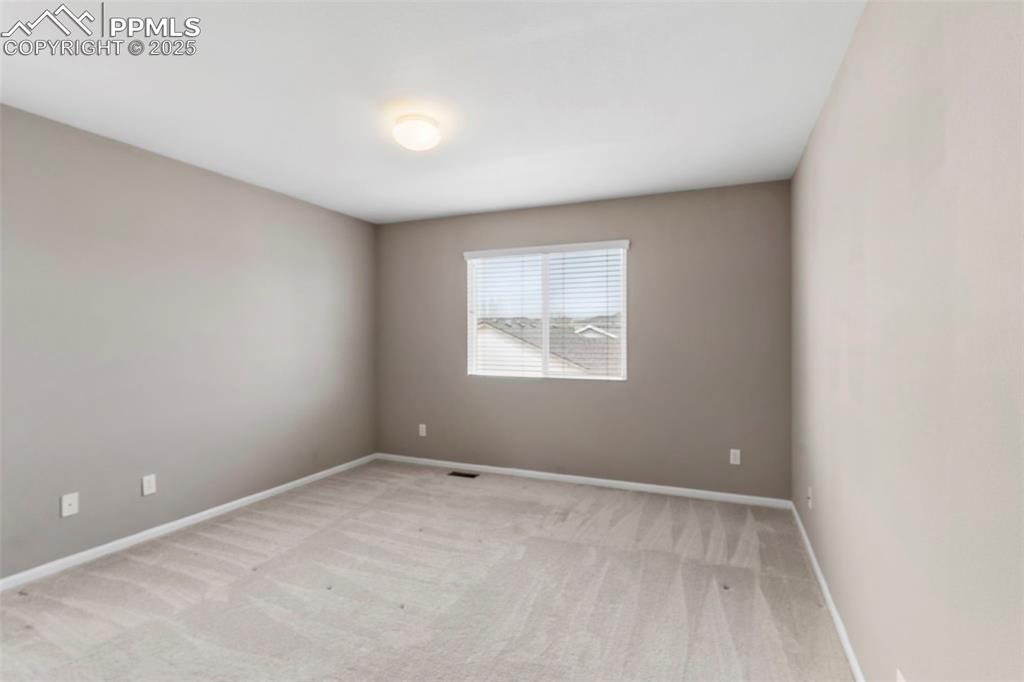 7710 Sistine Lane Fountain, CO 80817 - Photo 12 of 33 an empty room with a window