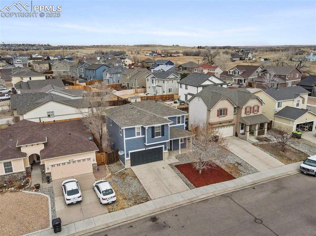 7710 Sistine Lane Fountain, CO 80817 - Photo 19 of 33 an aerial view of residential houses with yard