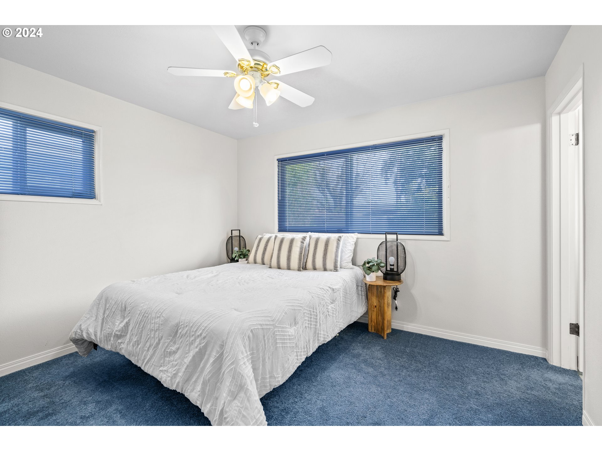 1841 Market Street Springfield, OR 97477 - Photo 12 of 23 a bedroom with a bed and a painting on the wall
