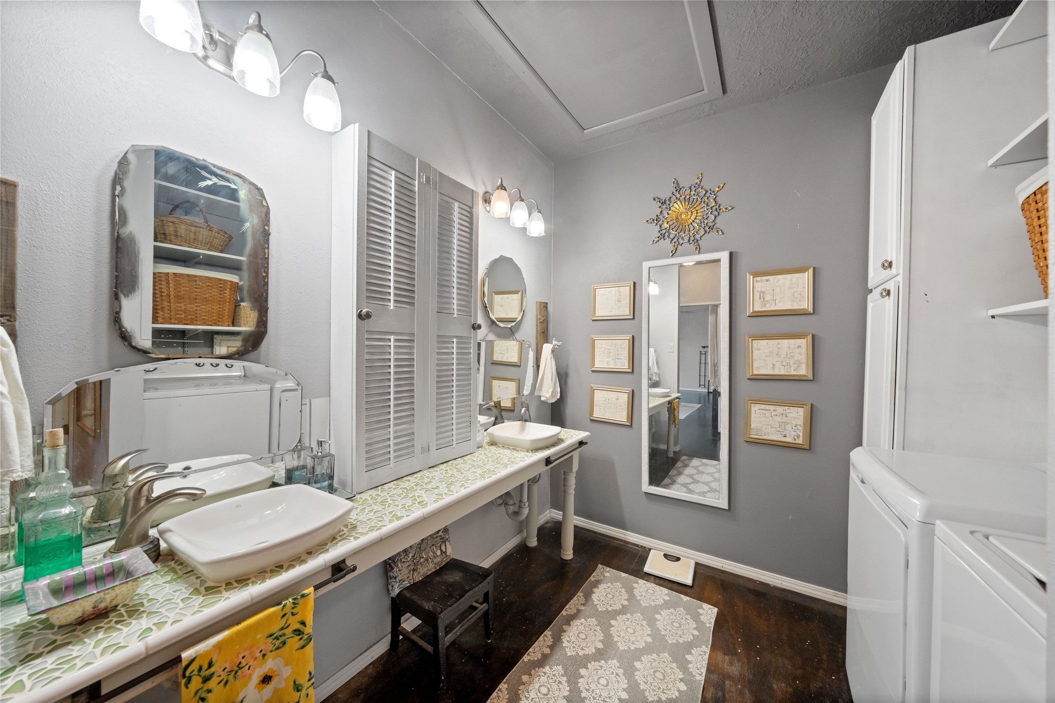 26407 Preston Avenue Spring, TX 77373 - Photo 21 of 38 a bathroom with a sink a mirror and a shower