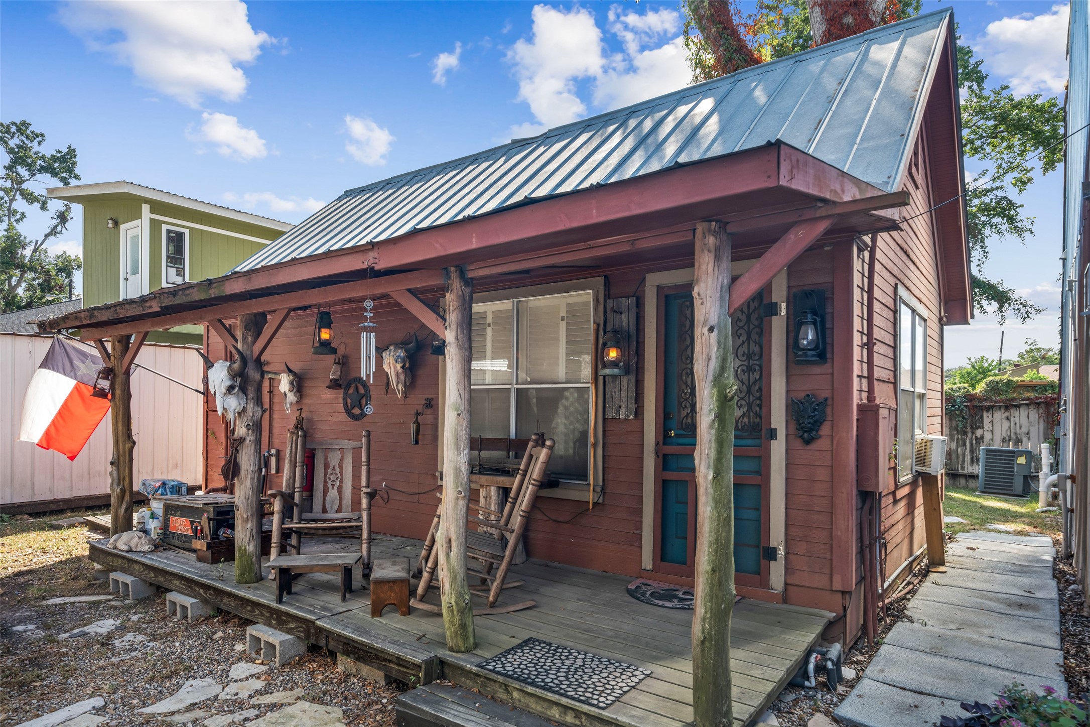 26407 Preston Avenue Spring, TX 77373 - Photo 29 of 38 One room rustic cottage has great front porch, living/bath/kitchenette. Perfect for steady rent income.