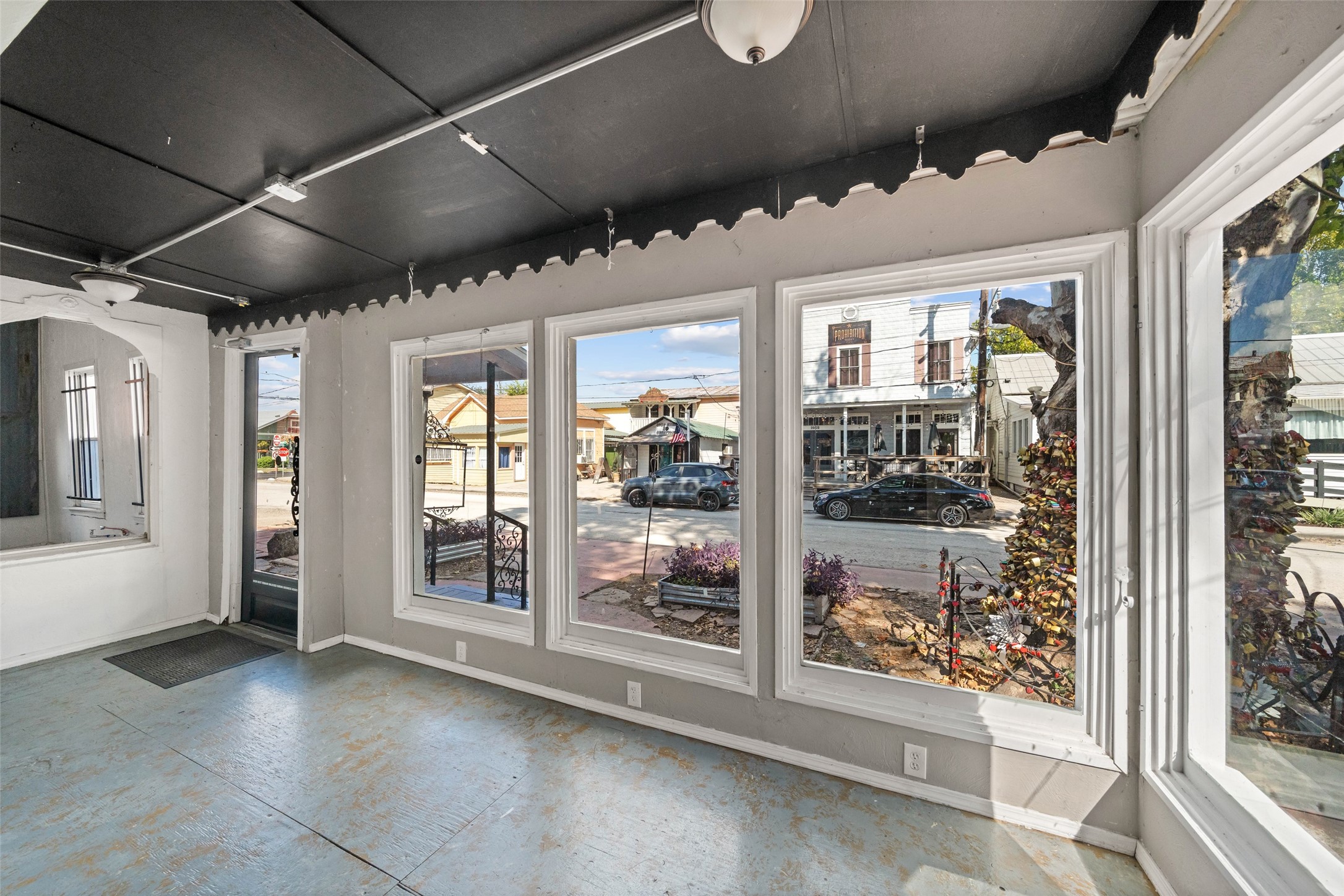 26407 Preston Avenue Spring, TX 77373 - Photo 7 of 38 Front entry to this quaint shop is full of natural light and spacious windows with excellent street views.