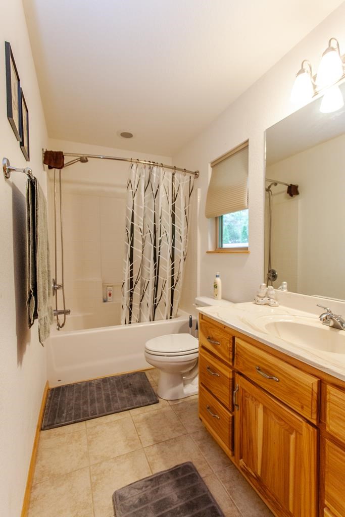 164 Freedom Pass Drive Murphy, NC 28906 - Photo 12 of 65 a bathroom with a granite countertop sink toilet and shower