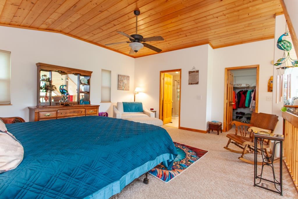 164 Freedom Pass Drive Murphy, NC 28906 - Photo 17 of 65 a bedroom with a bed and wooden floor