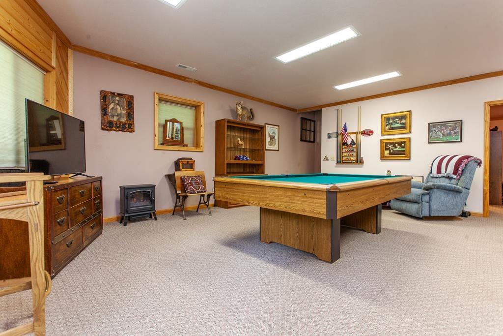 164 Freedom Pass Drive Murphy, NC 28906 - Photo 26 of 65 a living room with furniture and a flat screen tv