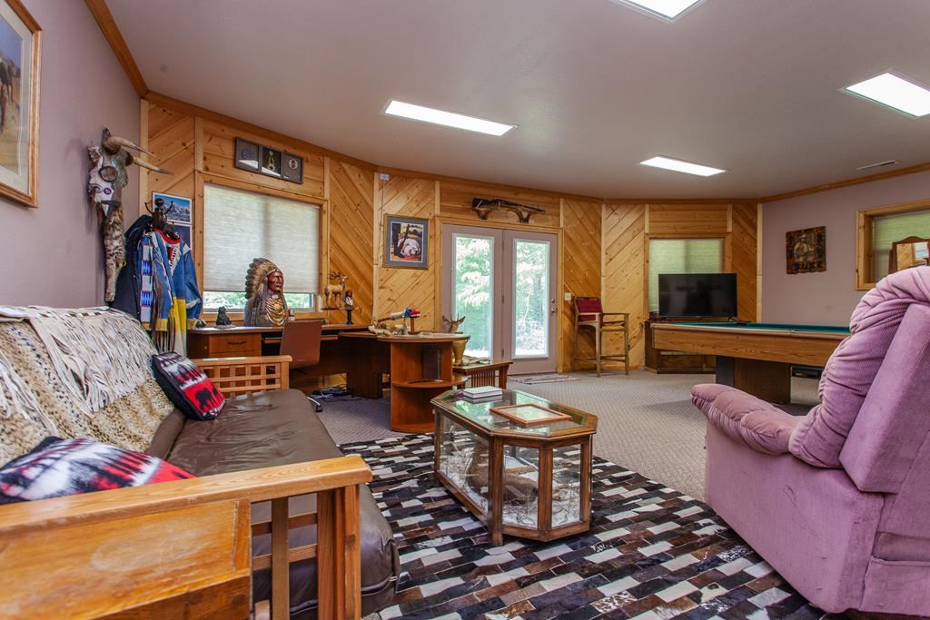 164 Freedom Pass Drive Murphy, NC 28906 - Photo 29 of 65 a living room with furniture and a flat screen tv