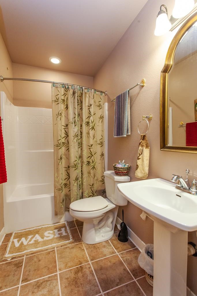 164 Freedom Pass Drive Murphy, NC 28906 - Photo 34 of 65 a bathroom with a sink toilet and shower