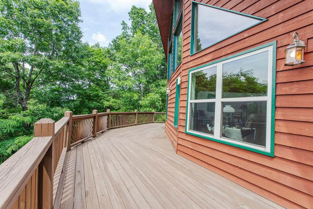 164 Freedom Pass Drive Murphy, NC 28906 - Photo 52 of 65 a view of balcony with wooden floor and fence