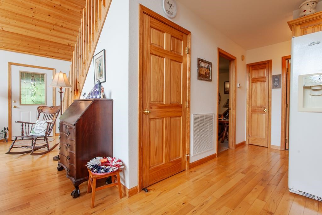 164 Freedom Pass Drive Murphy, NC 28906 - Photo 7 of 65 a view of a livingroom with furniture and hardwood floor