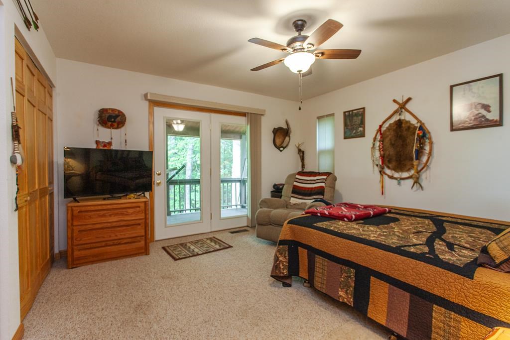 164 Freedom Pass Drive Murphy, NC 28906 - Photo 8 of 65 a living room with furniture and a flat screen tv