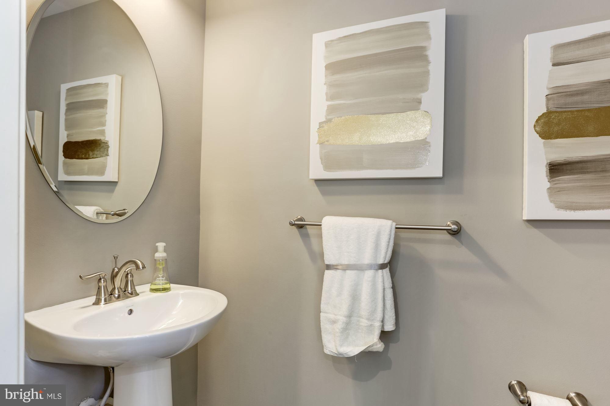308 Ruffian Road Camp Hill, PA 17011 - Photo 12 of 19 a bathroom with a sink and a mirror