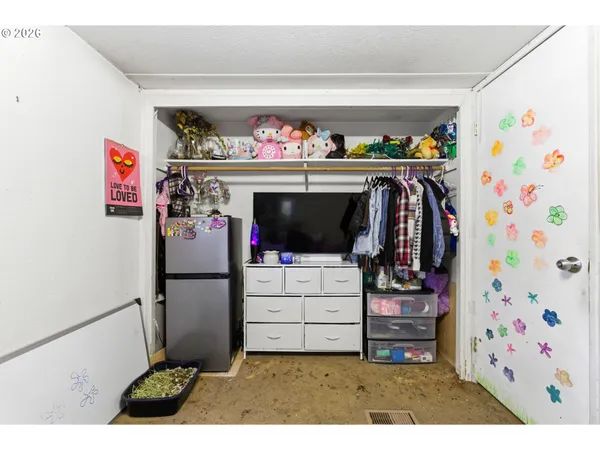 a view of hallway with washer and dryer