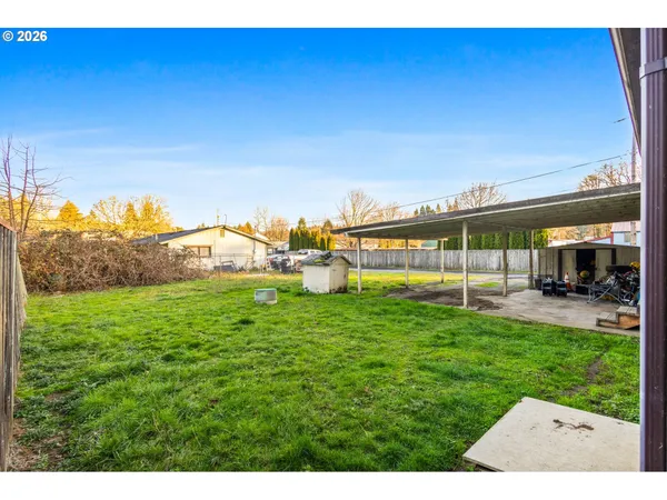 a view of a garden with an outdoor space