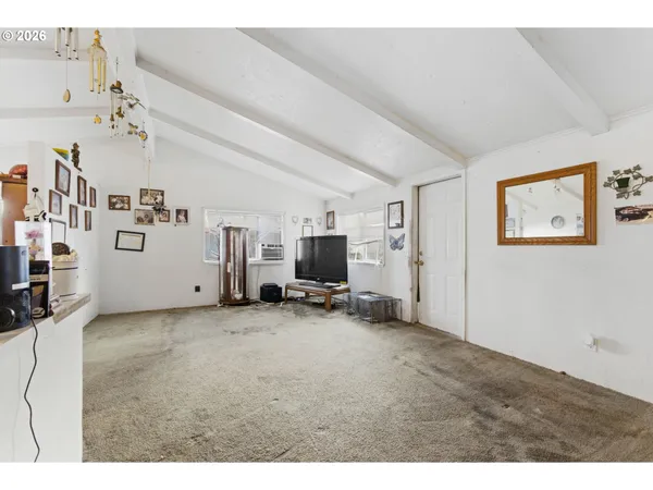a view of a livingroom with natural light