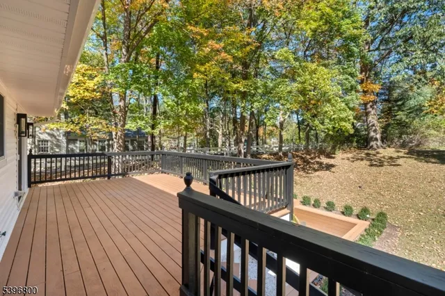 a view of balcony with wooden floor