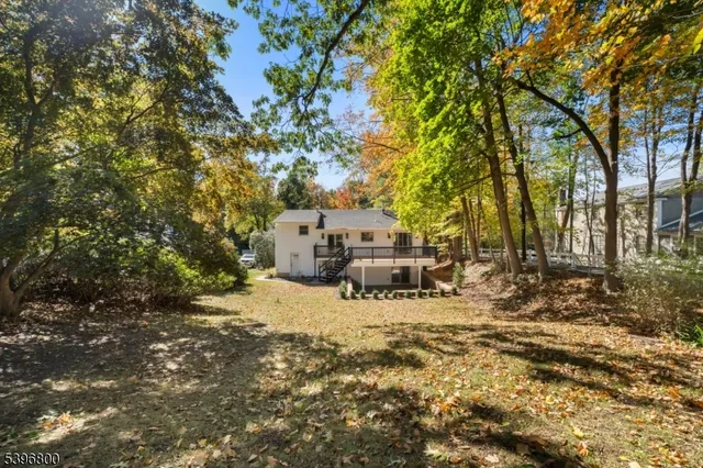 a view of a yard with patio
