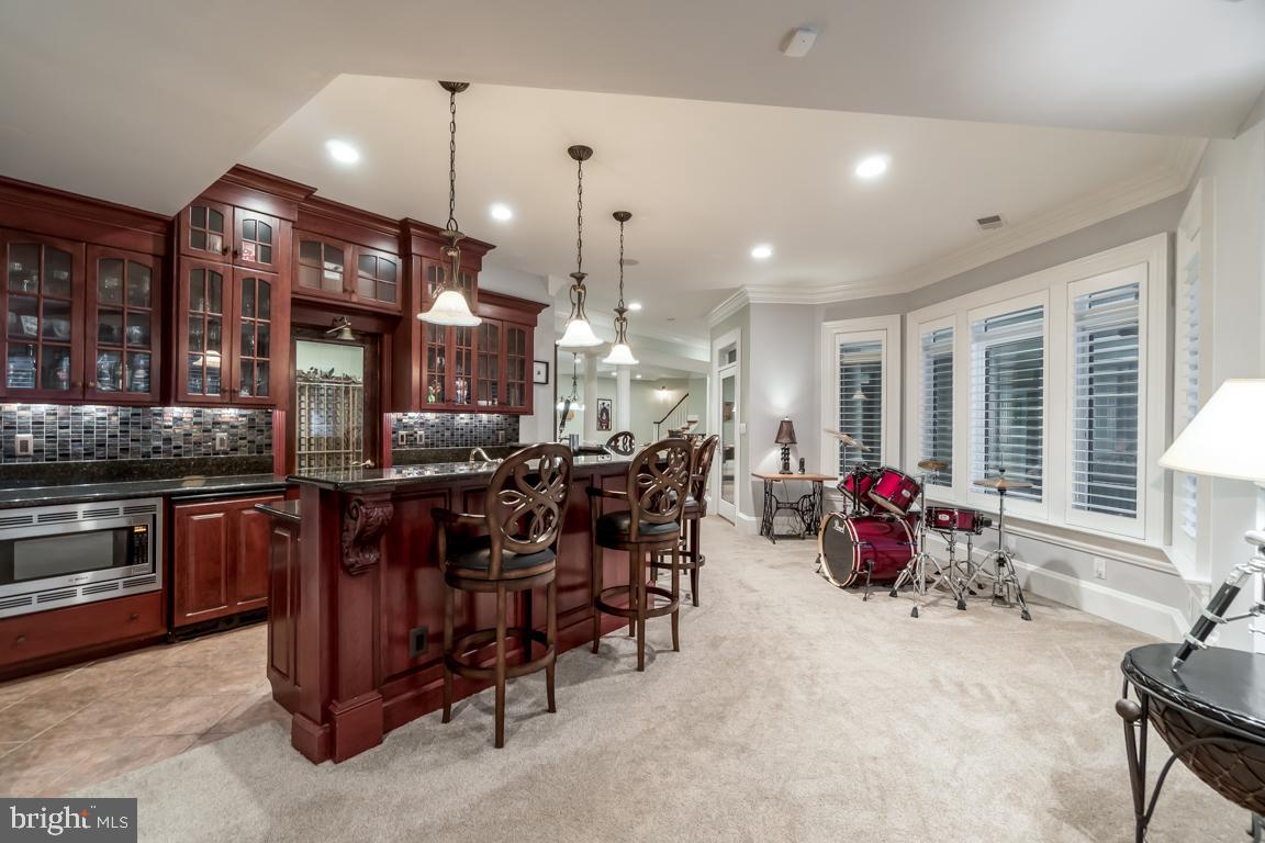 15330 Riding Club Drive Haymarket, VA 20169 - Photo 55 of 59 Basement wet bar