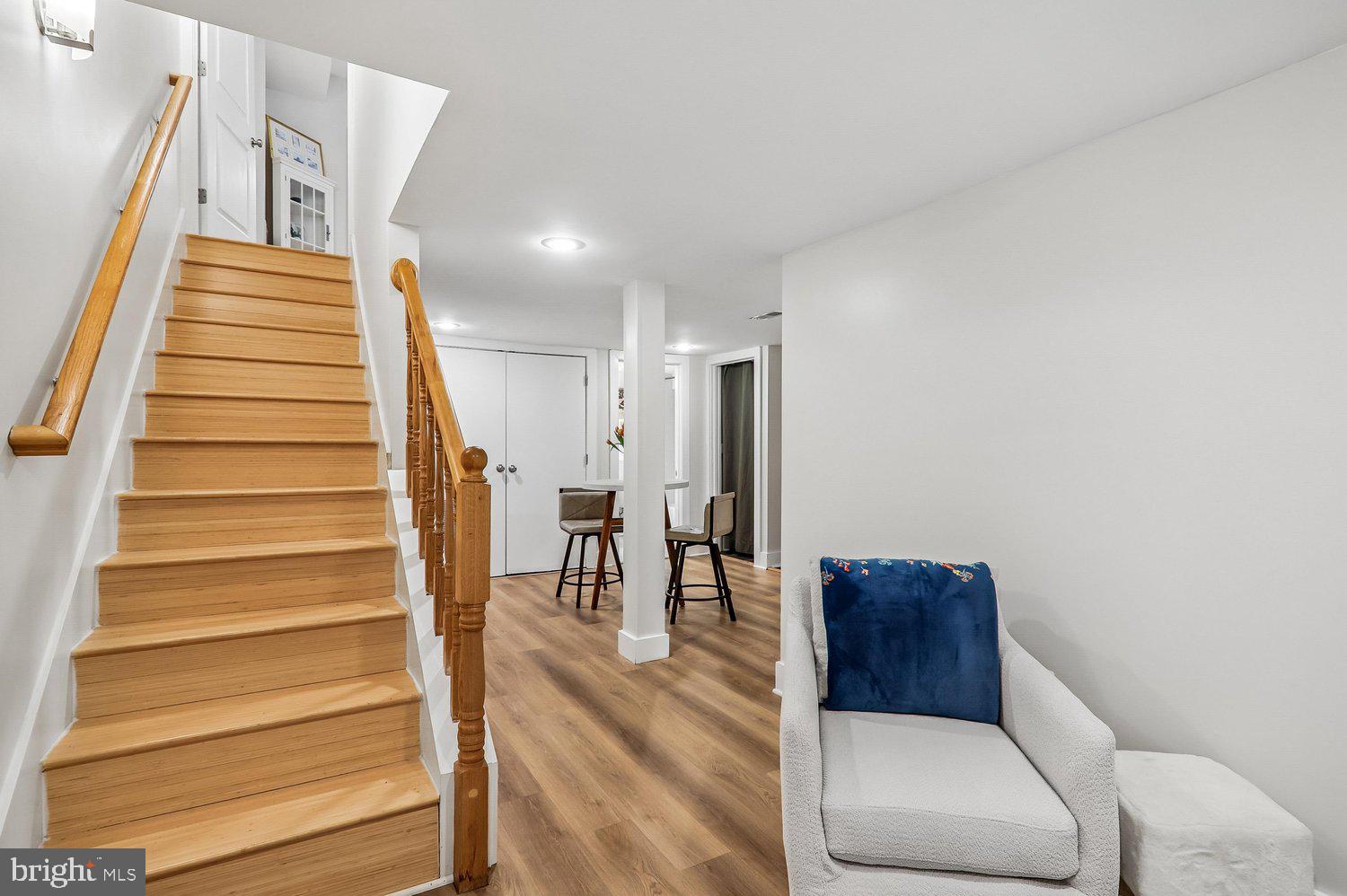 911 L Street Northeast Washington, DC 20002 - Photo 32 of 48 a living room with furniture and a stairs