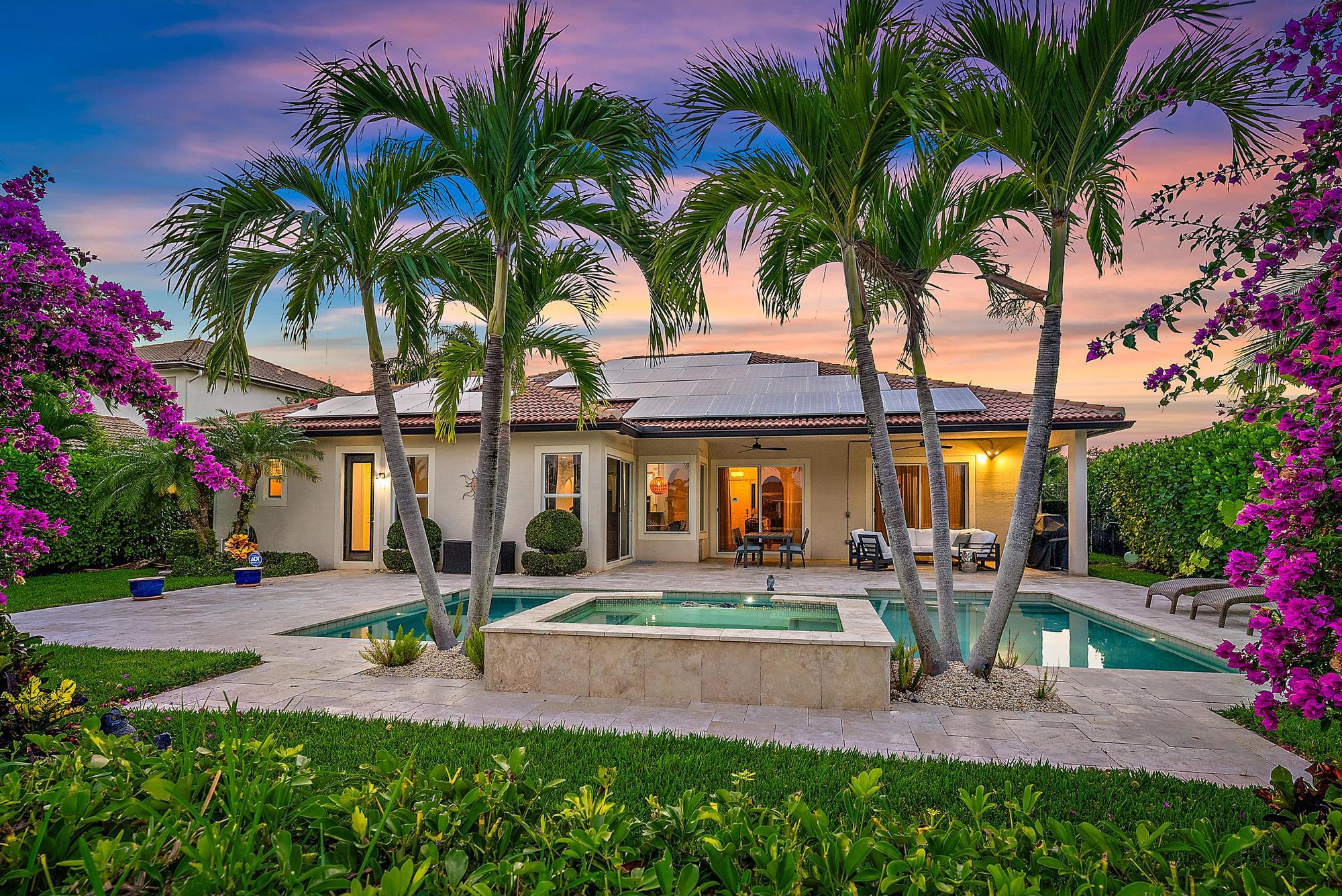 128 Casa Circle Jupiter, FL 33458 - Photo 2 of 78 Pool & Back Exterior