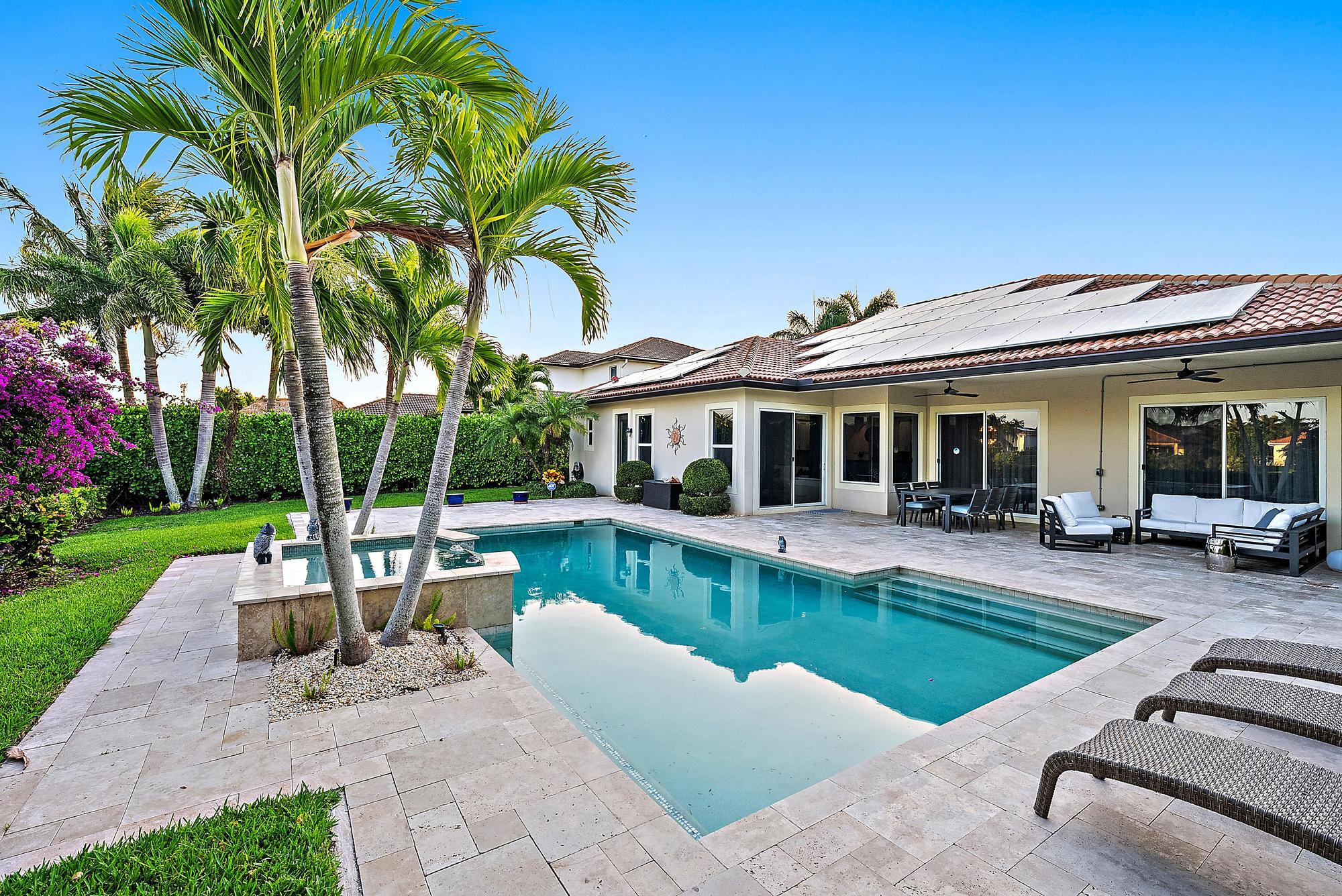 128 Casa Circle Jupiter, FL 33458 - Photo 43 of 78 Pool & Back Exterior